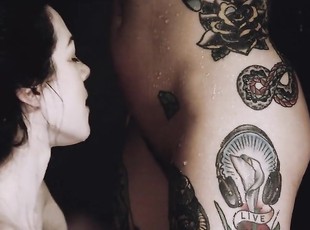 Tattooed model Joanna Angel gets her pussy pleasured by sexy Stoya